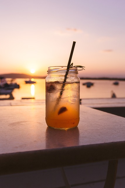 Enjoying succulent orange slices as the sun sets on the horizon. 