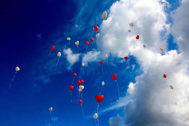 Releasing balloons into the sky 