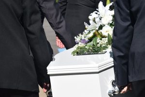 Attending a Funeral with a Coffin