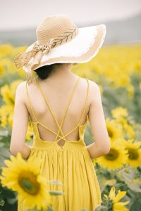 Standing in a Field of Sunflowers