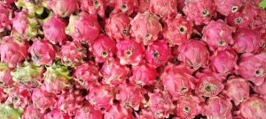 Buying Dragon Fruit at a Market