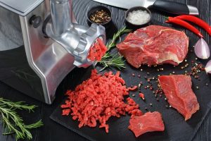 Raw Meat Being Prepared for Cooking