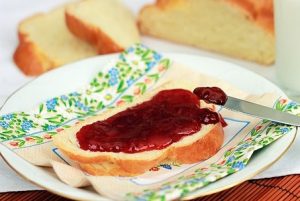 Spreading Fruit Preserves on Bread