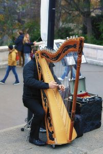 Struggling to Play the Harp